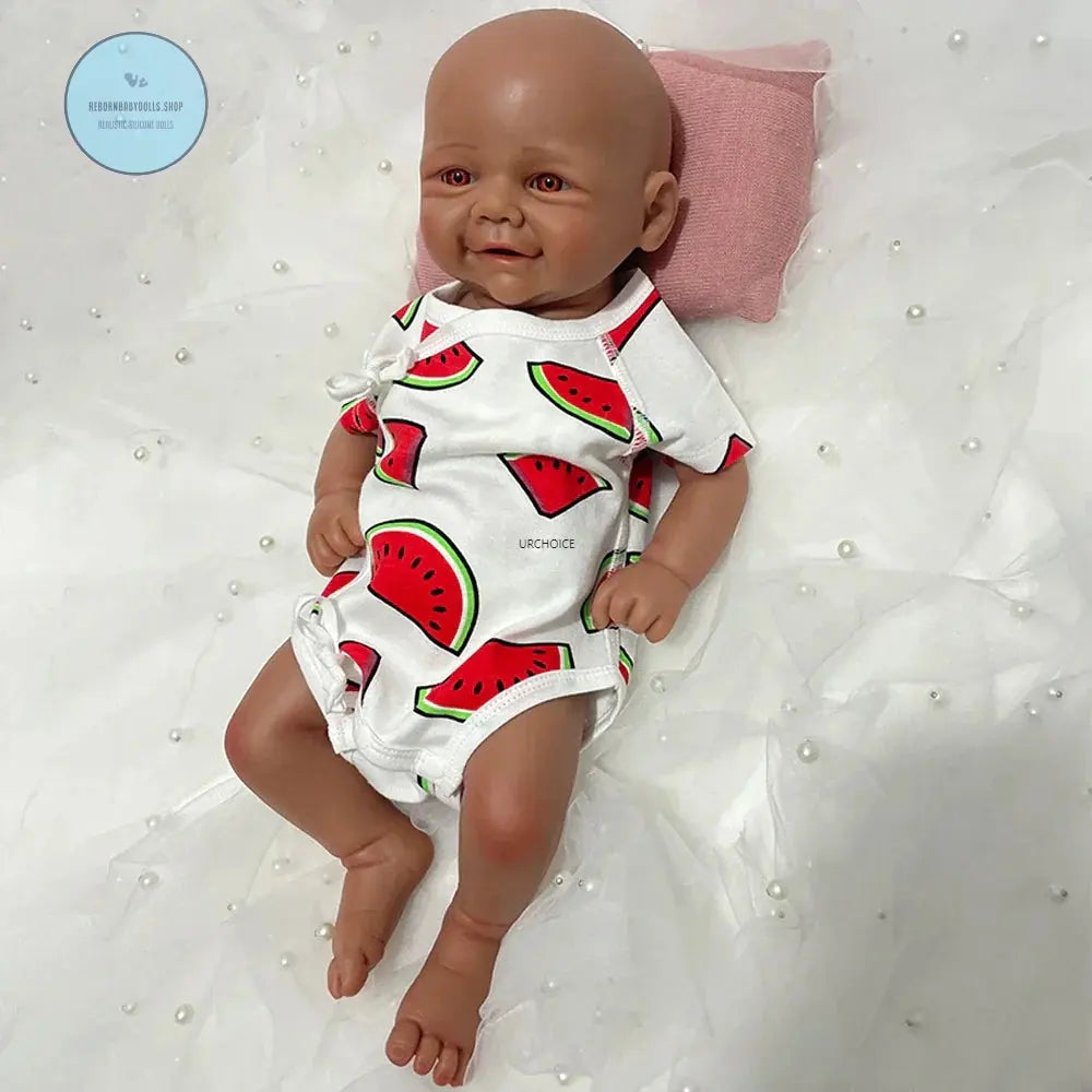 Black reborn baby doll with realistic African American features and lifelike skin tone
