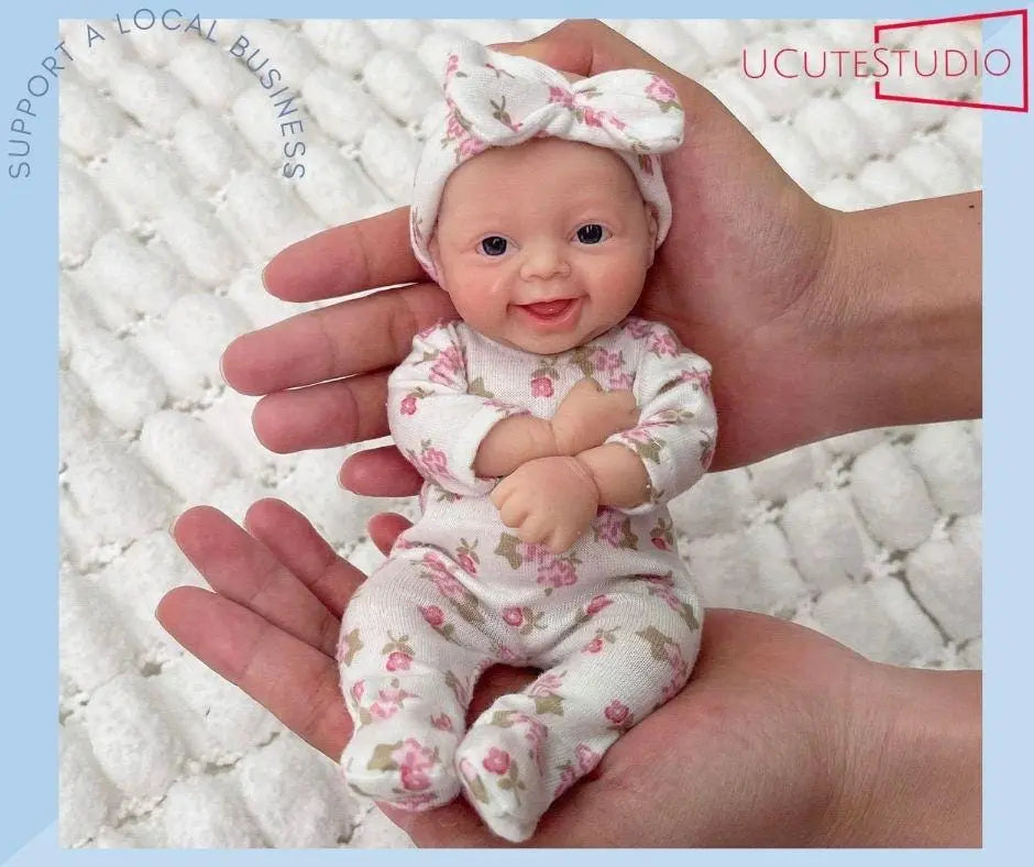 7-Inch Reborn Baby Doll – Handcrafted Silicone Platinum Girl with Realistic Full-Body Design smile, cute and clever girl doll rebornbabydolls.shop