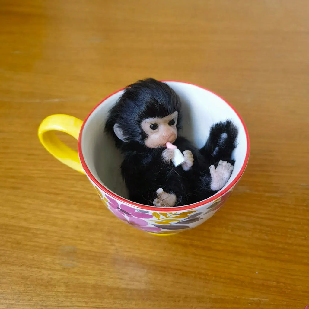 Image of Reborn Baby Dolls 6’’ Avani Doll Full Body Silicone Monkey Drinking