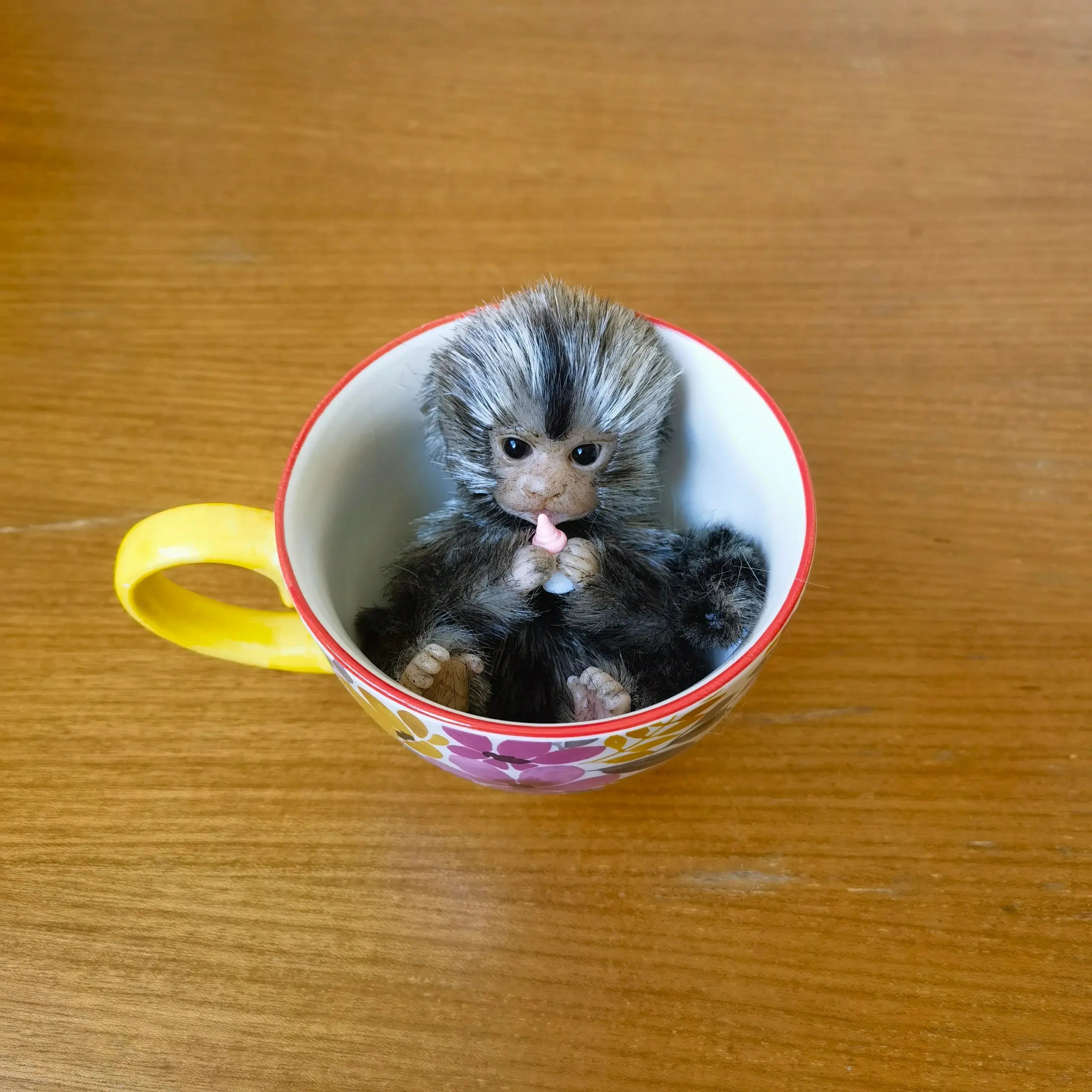 Image of Reborn Baby Dolls 6’’ Avani Doll Full Body Silicone Monkey Drinking