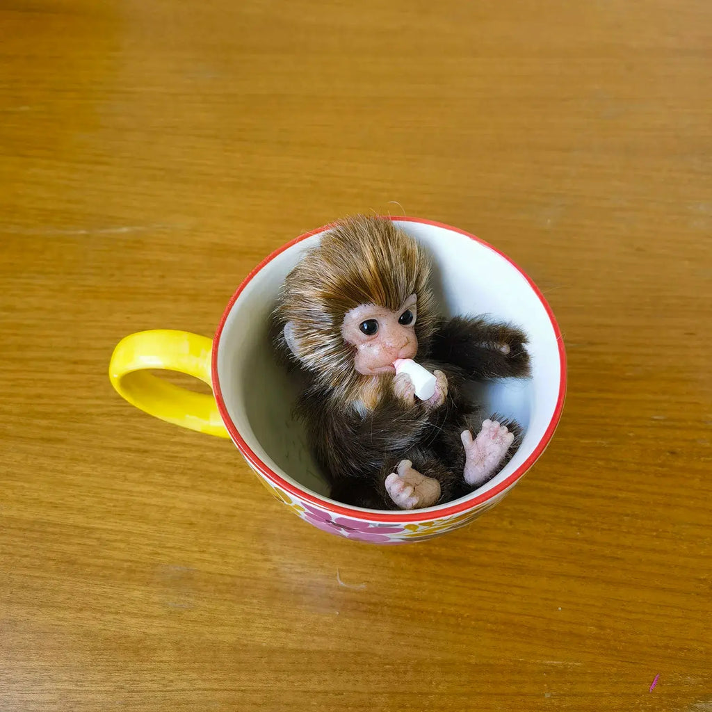 Image of Reborn Baby Dolls 6’’ Avani Doll Full Body Silicone Monkey Drinking