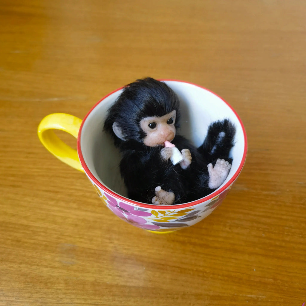 Image of Reborn Baby Dolls 6’’ Avani Doll Full Body Silicone Monkey Drinking