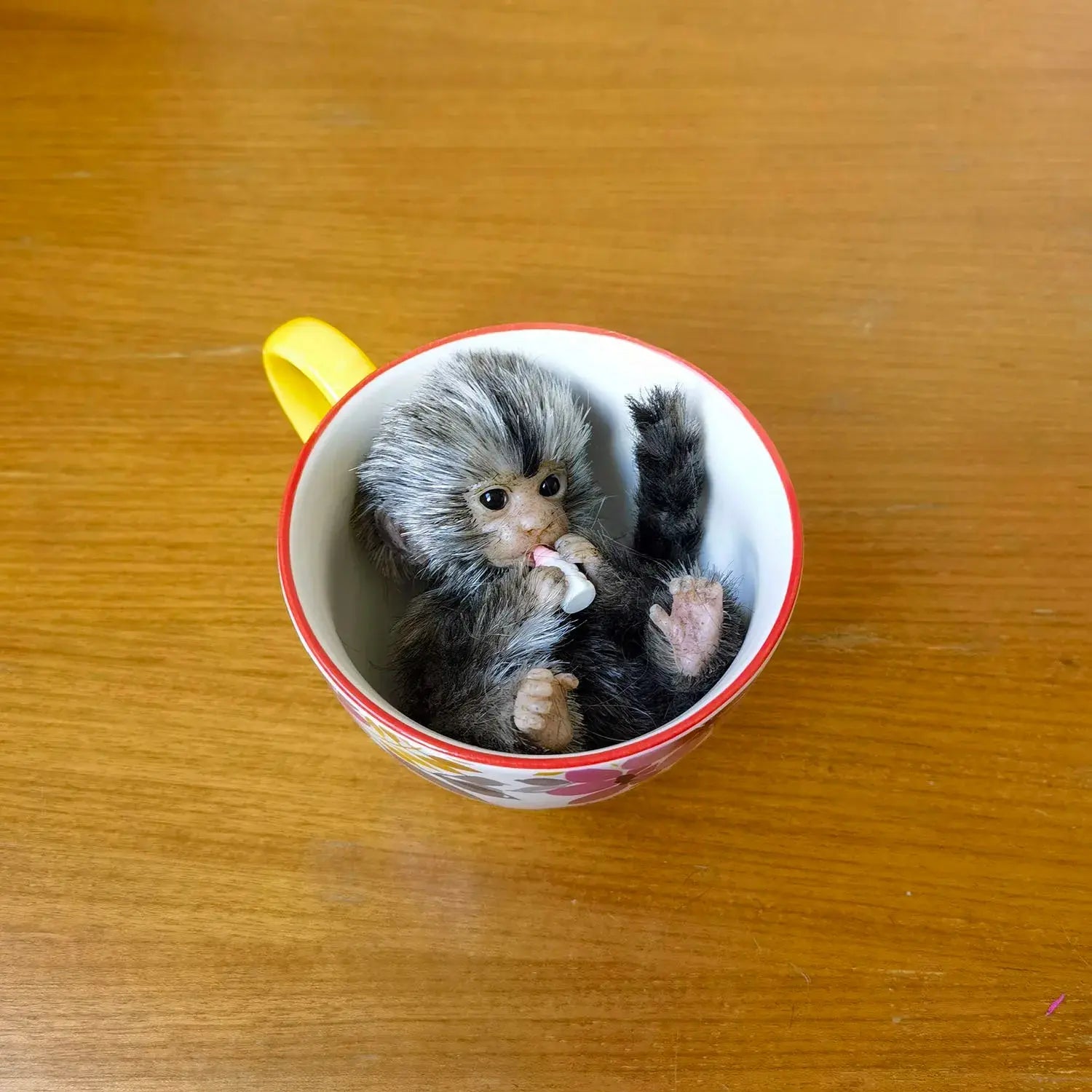 Image of Reborn Baby Dolls 6’’ Avani Doll Full Body Silicone Monkey Drinking