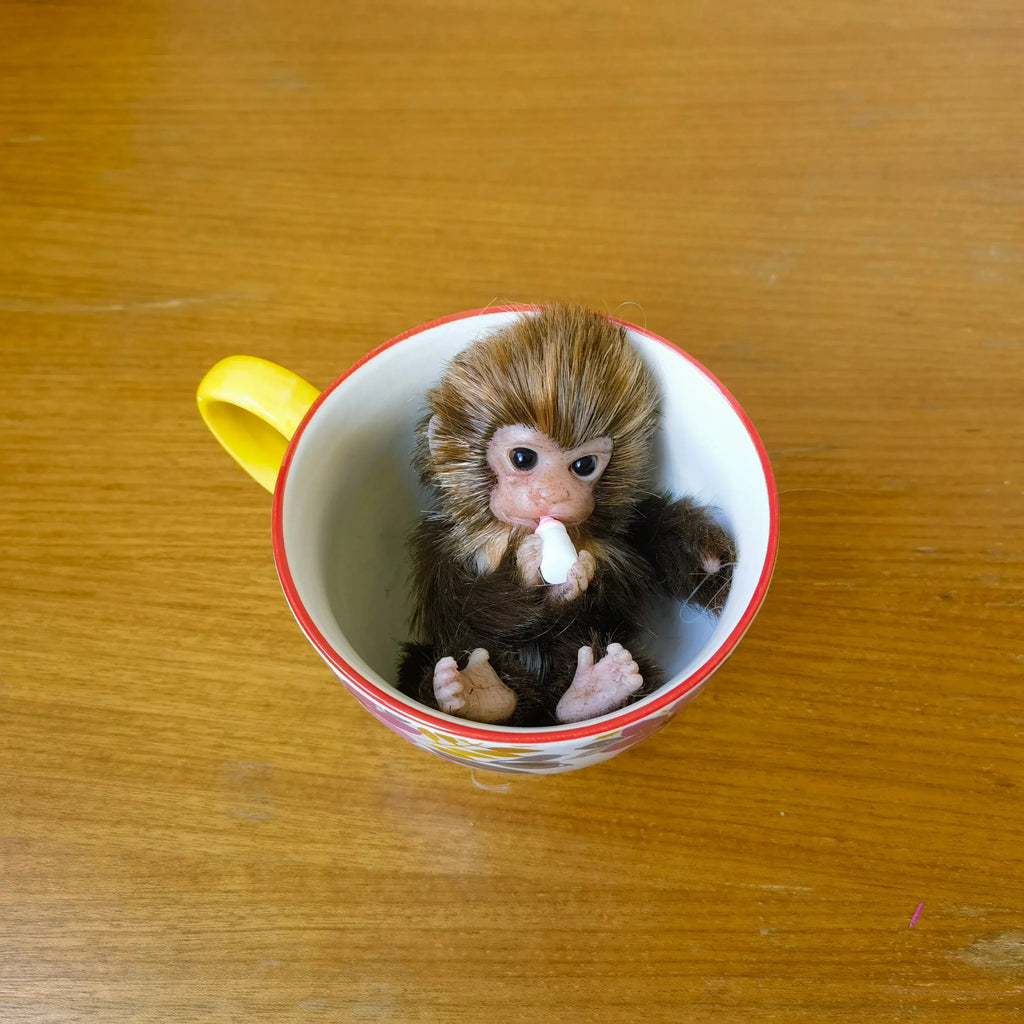 Image of Reborn Baby Dolls 6’’ Avani Doll Full Body Silicone Monkey Drinking