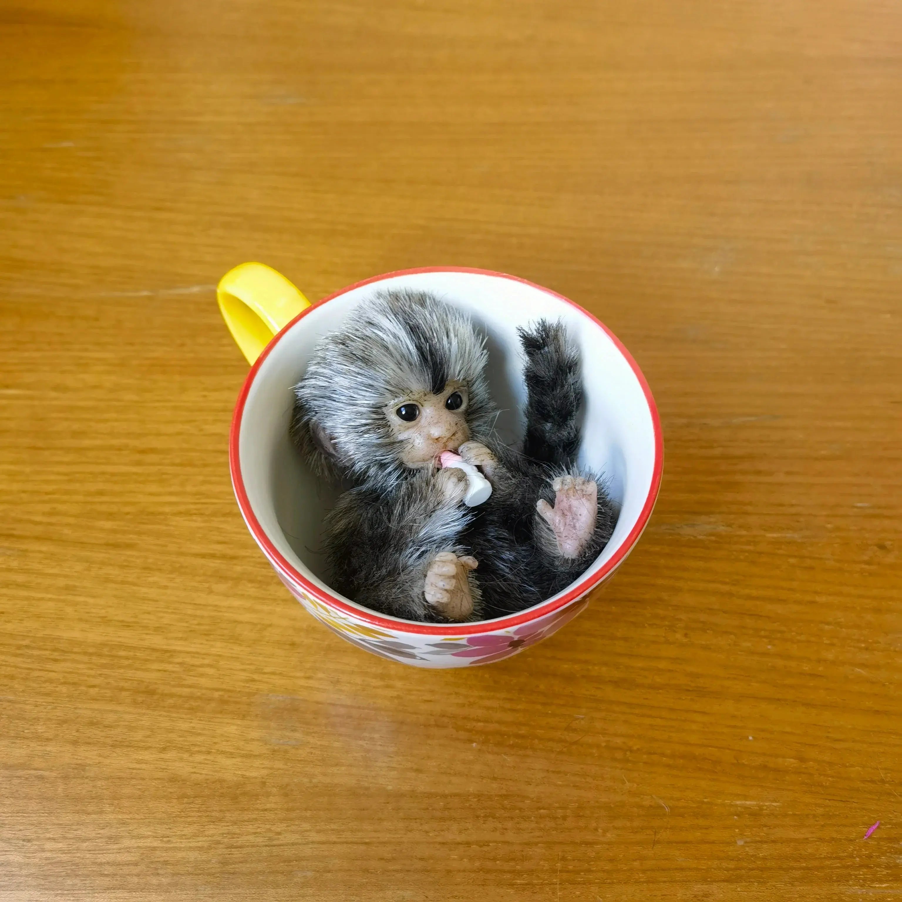 Image of Reborn Baby Dolls 6’’ Avani Doll Full Body Silicone Monkey Drinking